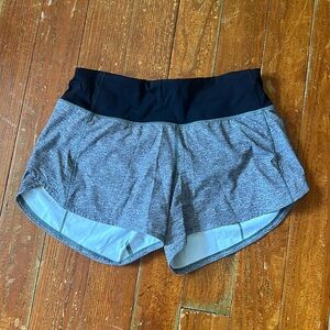 Speed Up Lululemon athletic shorts. Size 4 Tall. Grey with a black waistband!